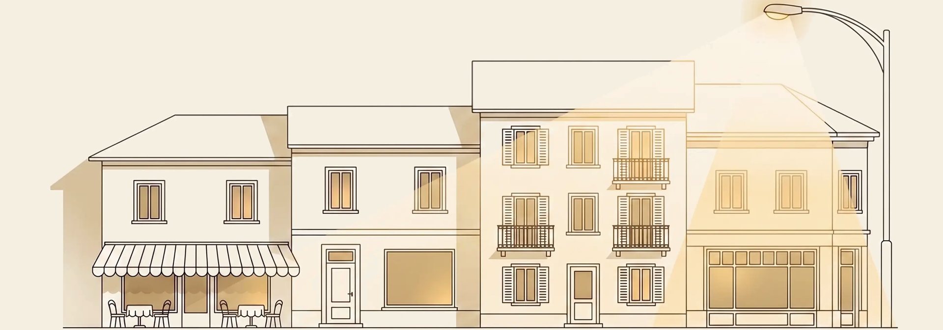 Illustrazione di una via di paese: un ristorante, un barbiere, un hotel e un negozio, ognuno con le vetrine accese.